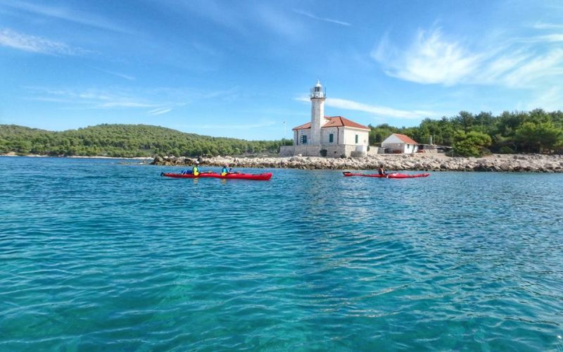 Lighthouse on island Brac - Old palace in Maslinica - Island hopping sea kayak tour Croatia - Red Adventures